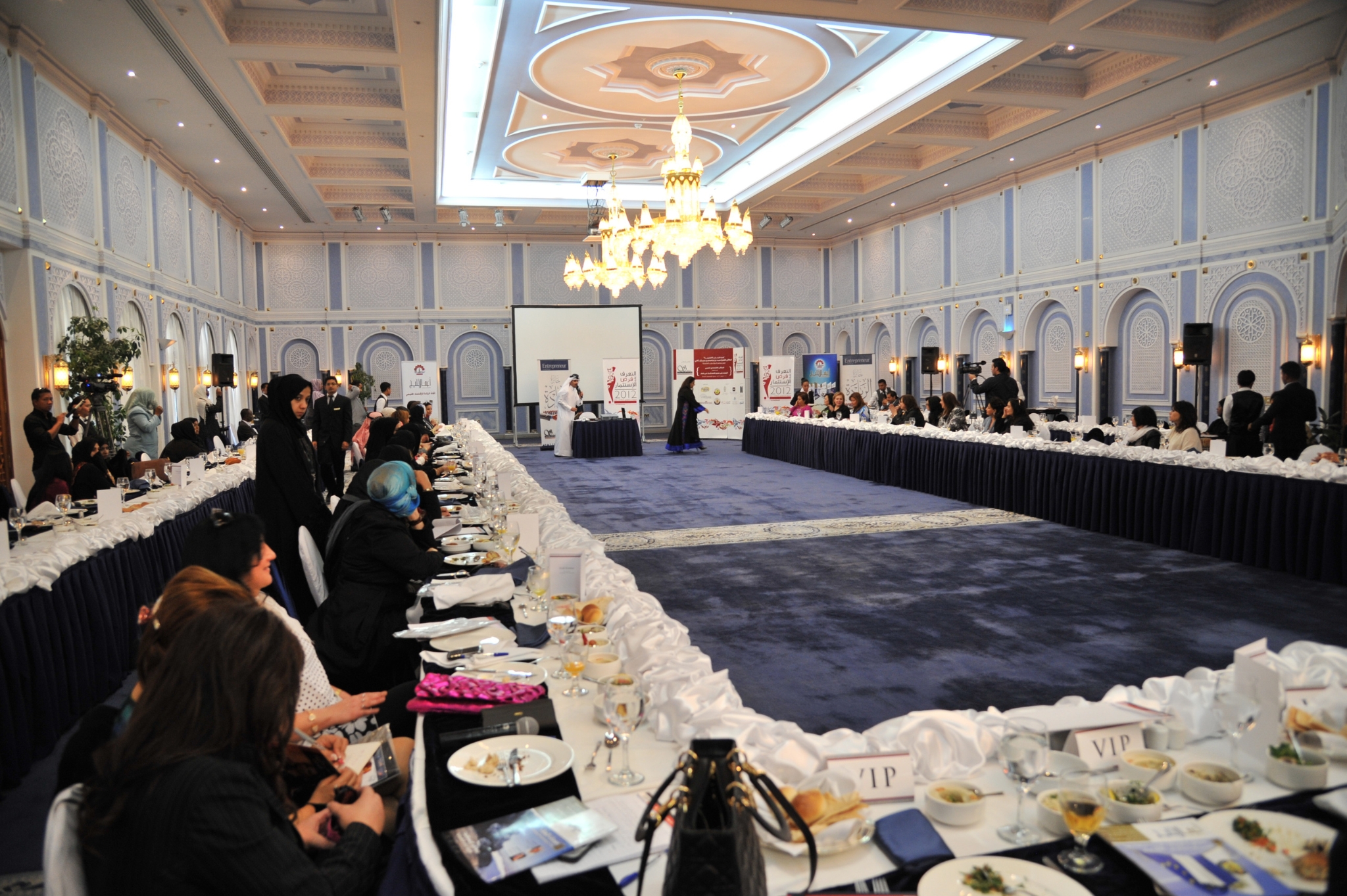 City skyline at sunset with orange glow.