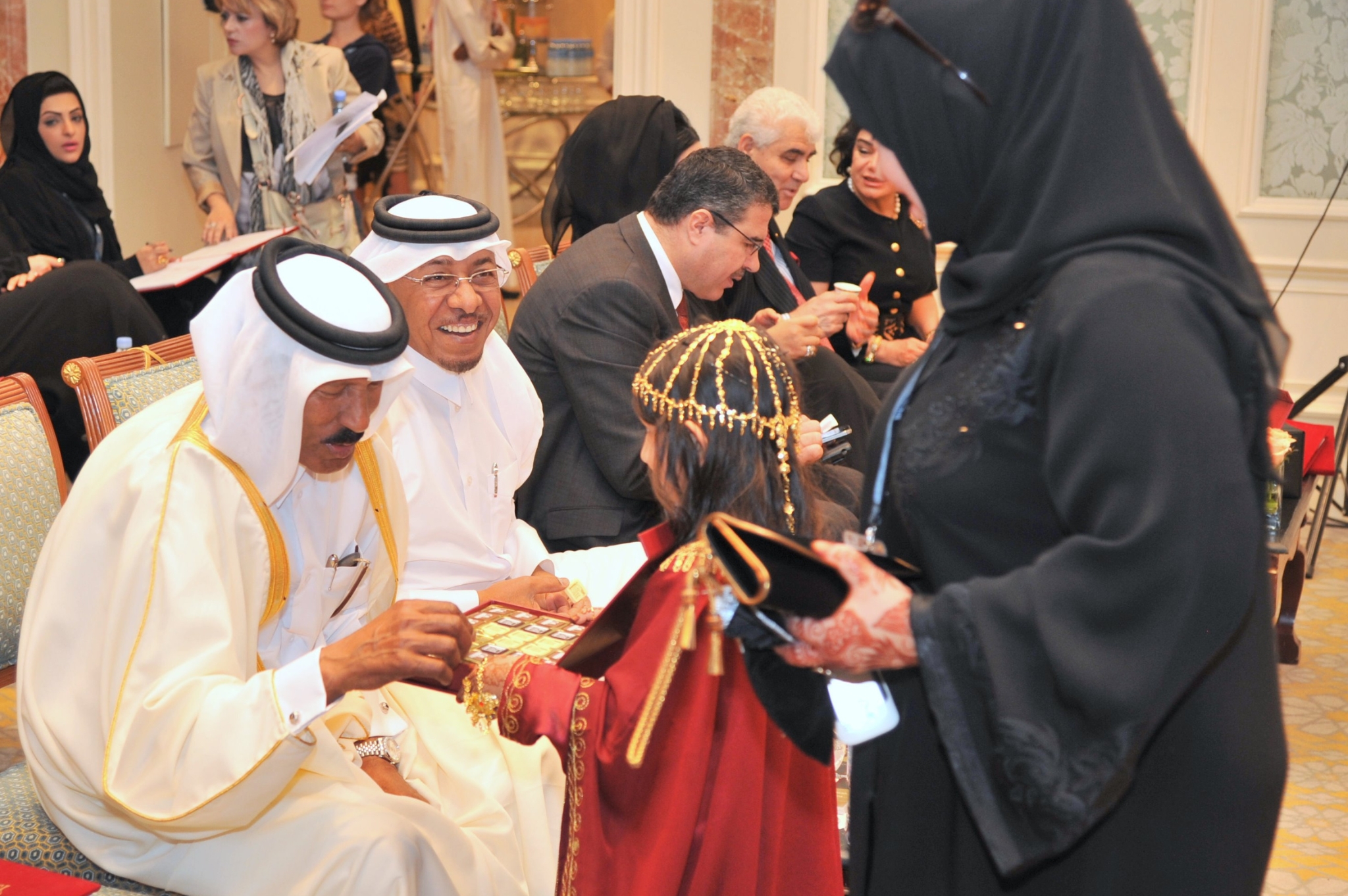 Curving forest road lined with tall pines.