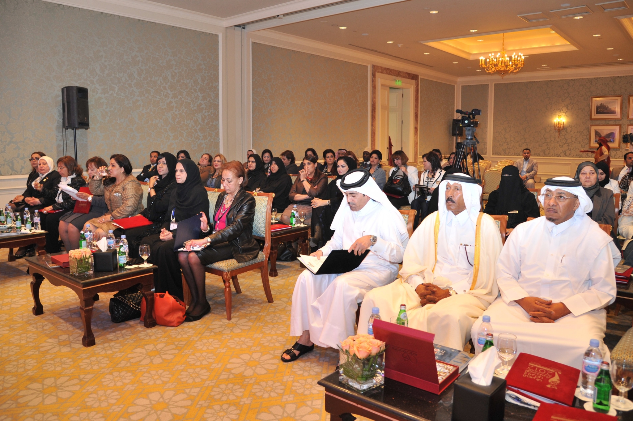 City skyline at sunset with orange glow.