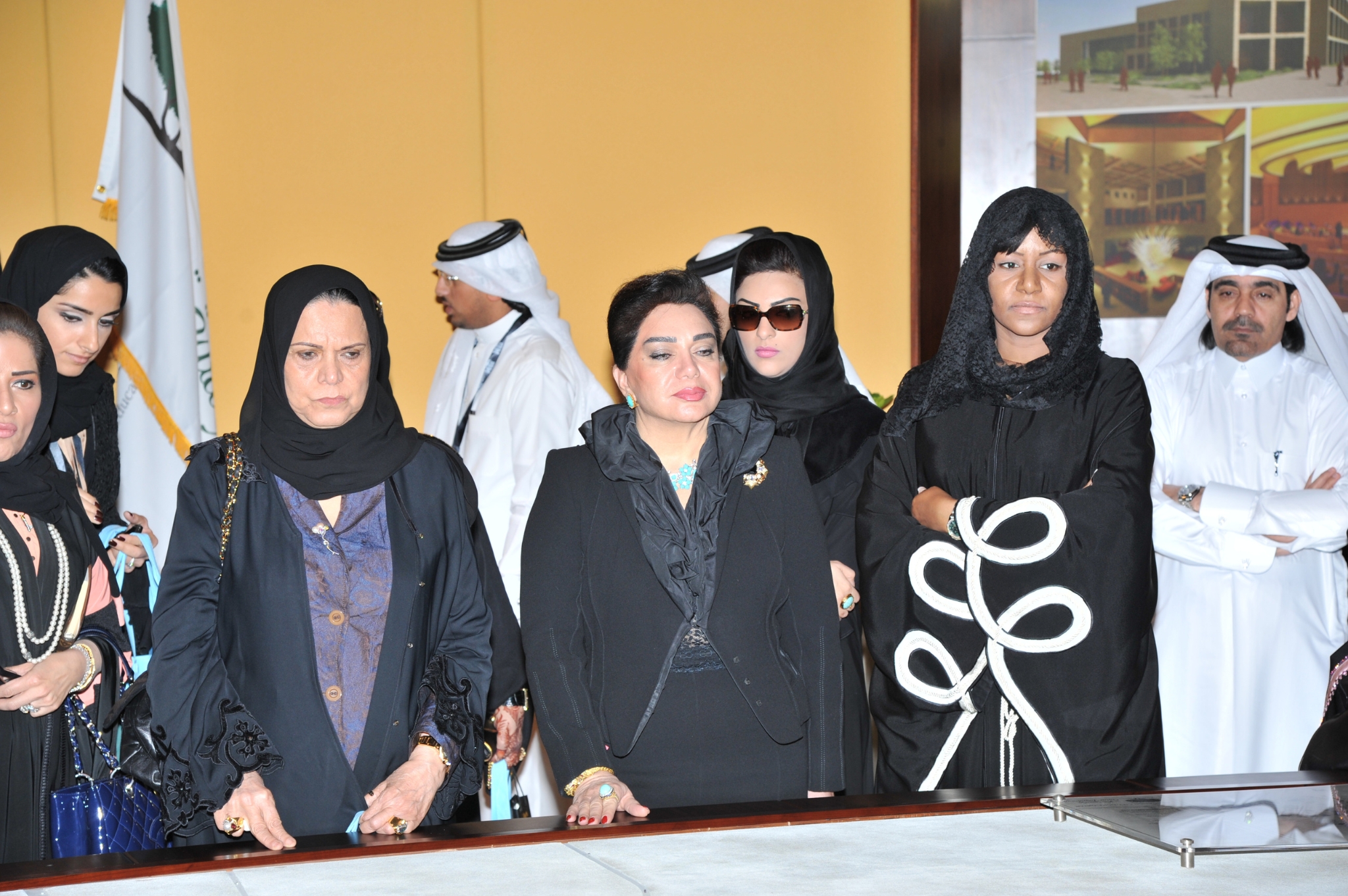 City skyline at sunset with orange glow.