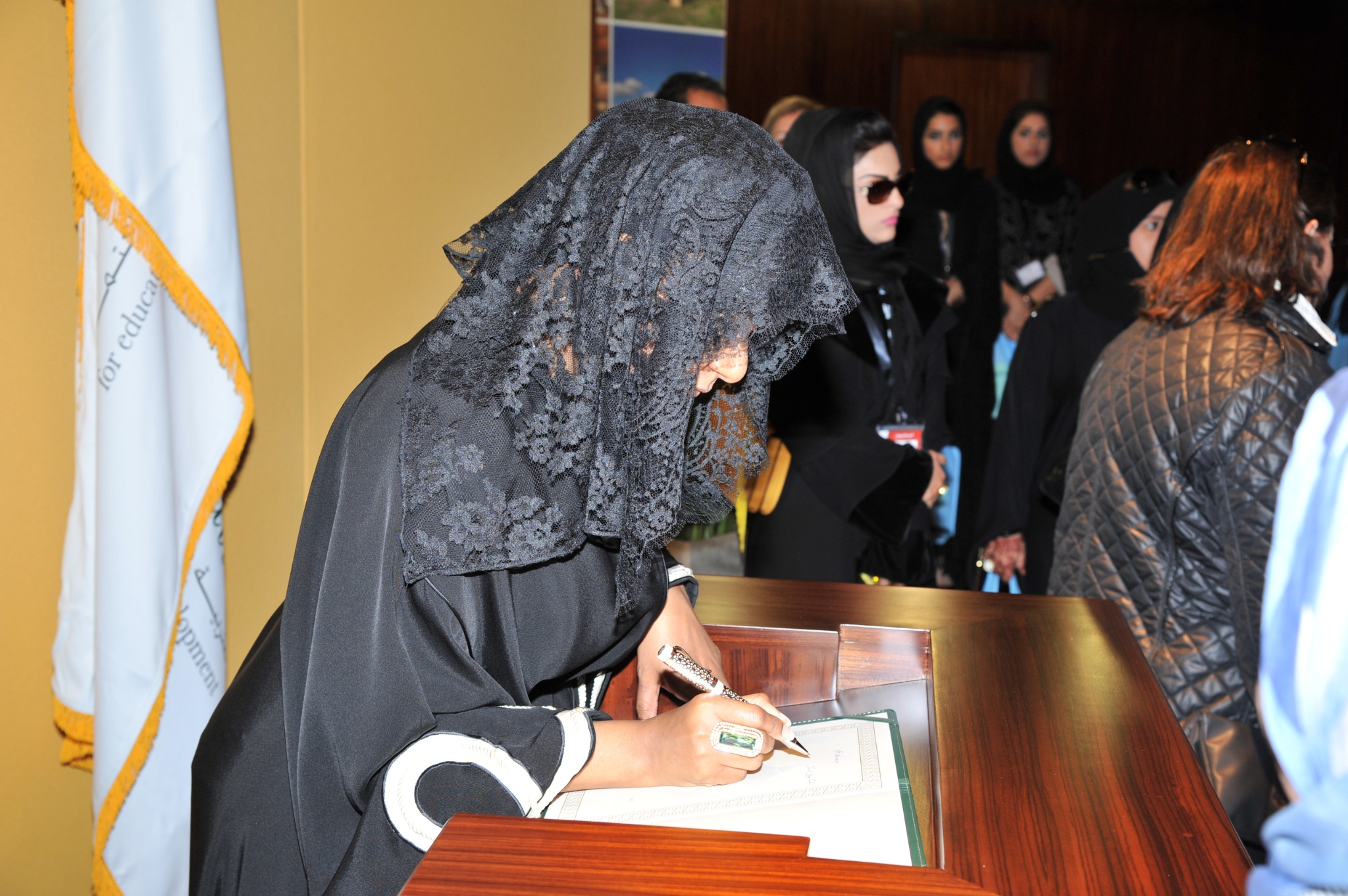 City skyline at sunset with orange glow.