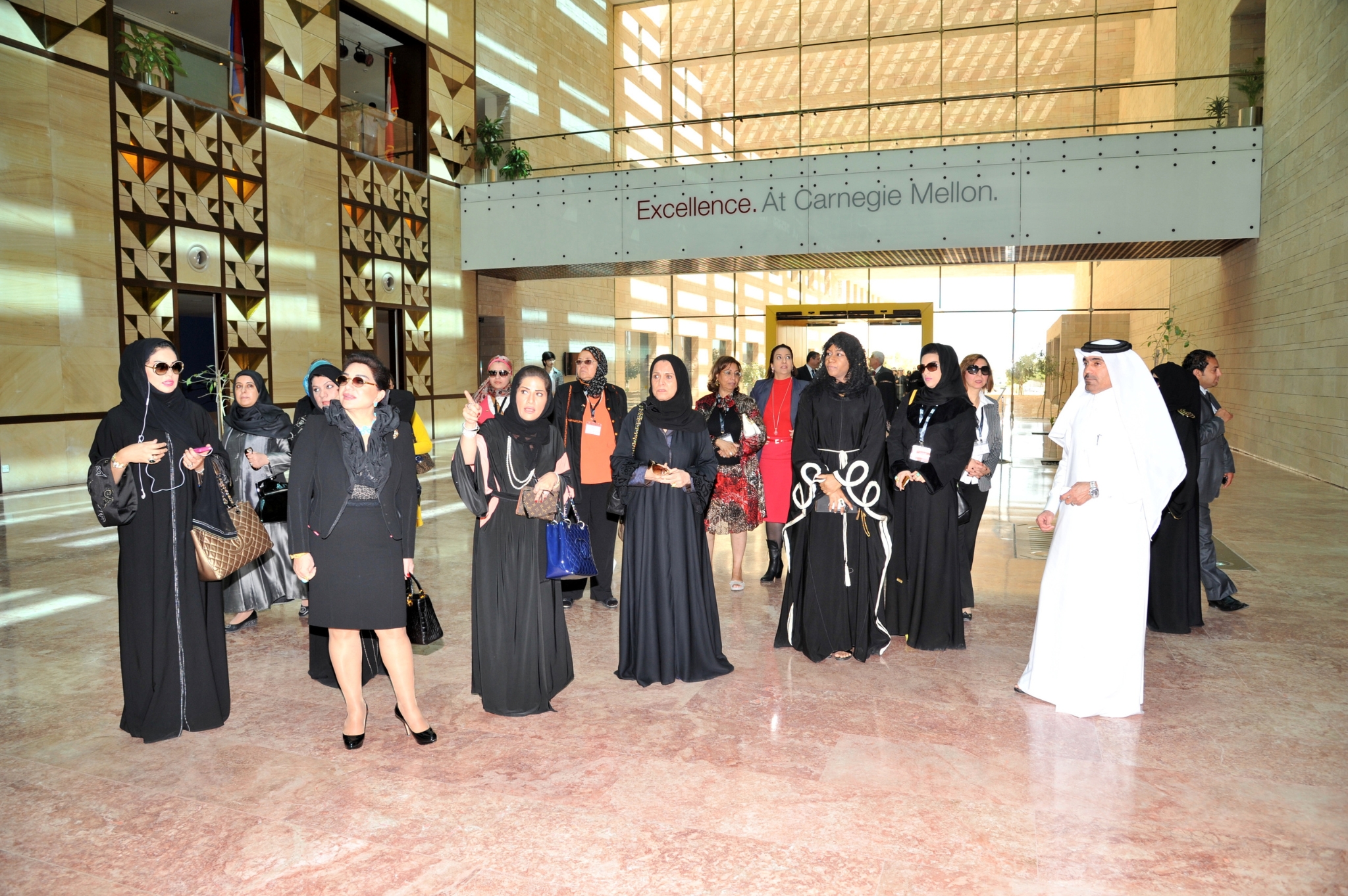 City skyline at sunset with orange glow.