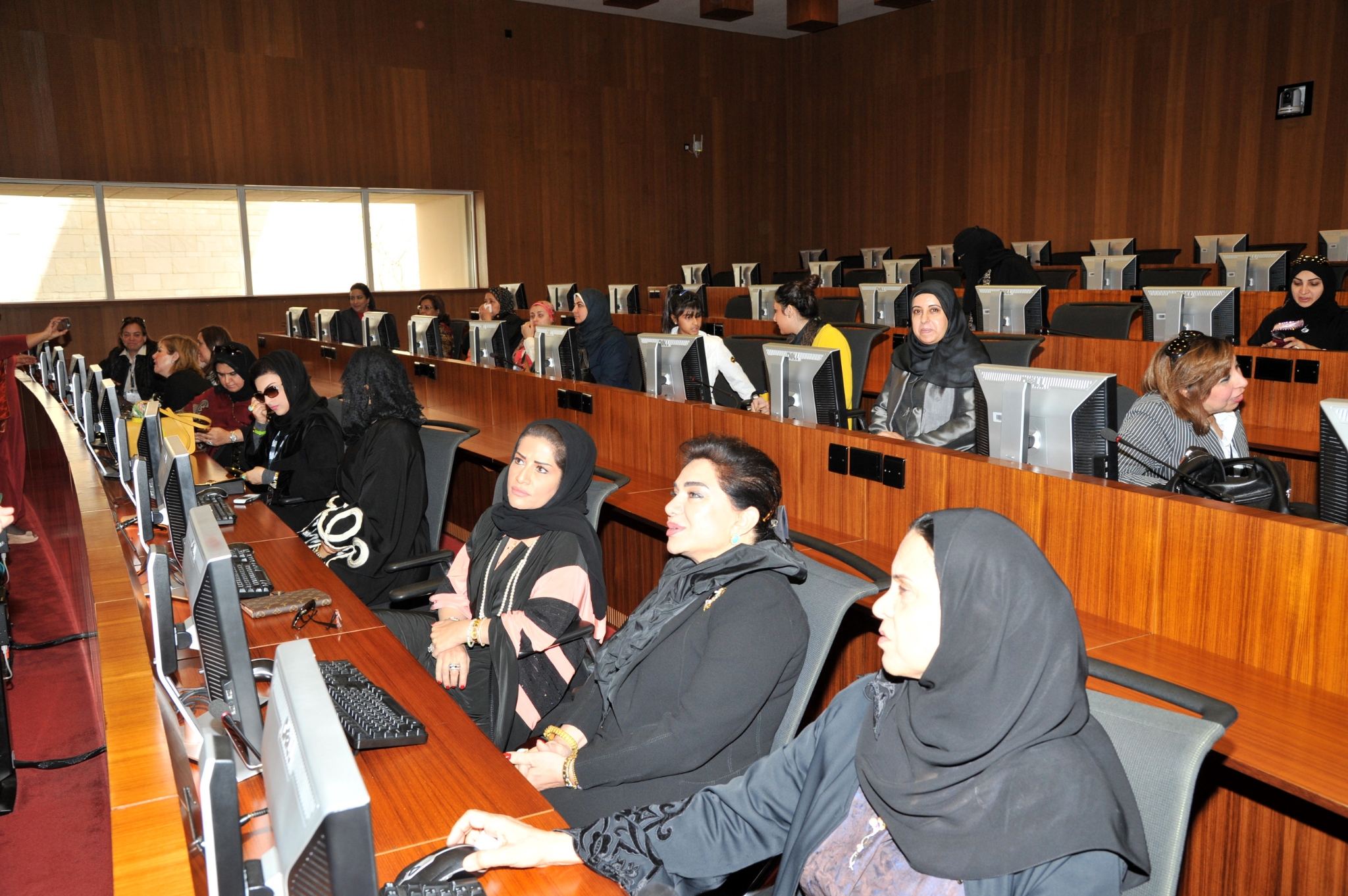 City skyline at sunset with orange glow.