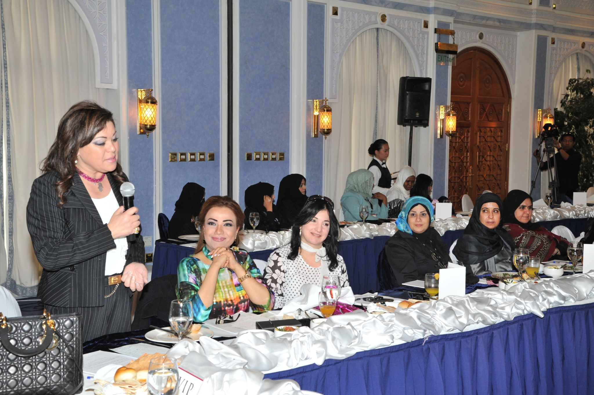 City skyline at sunset with orange glow.