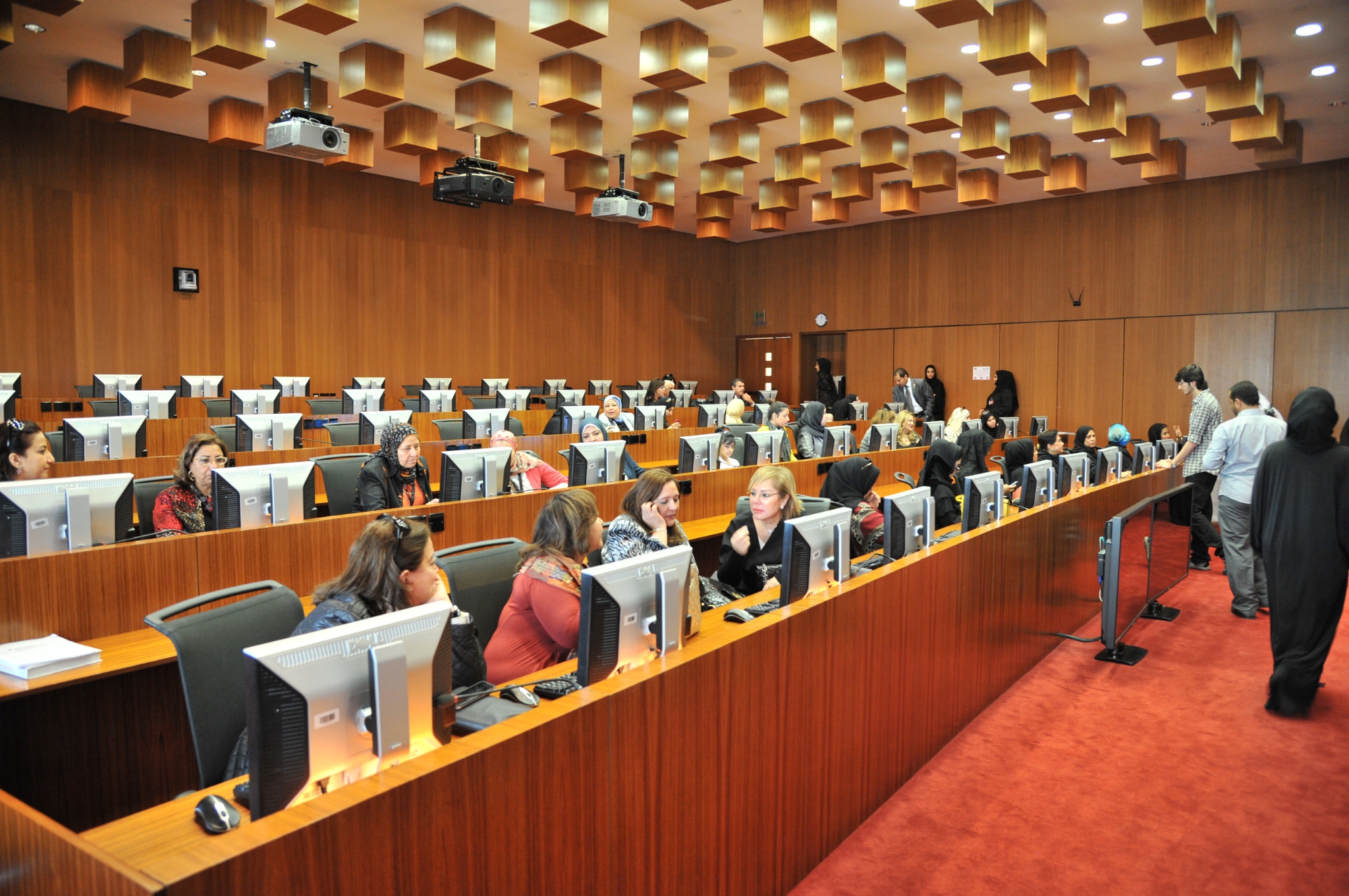 City skyline at sunset with orange glow.